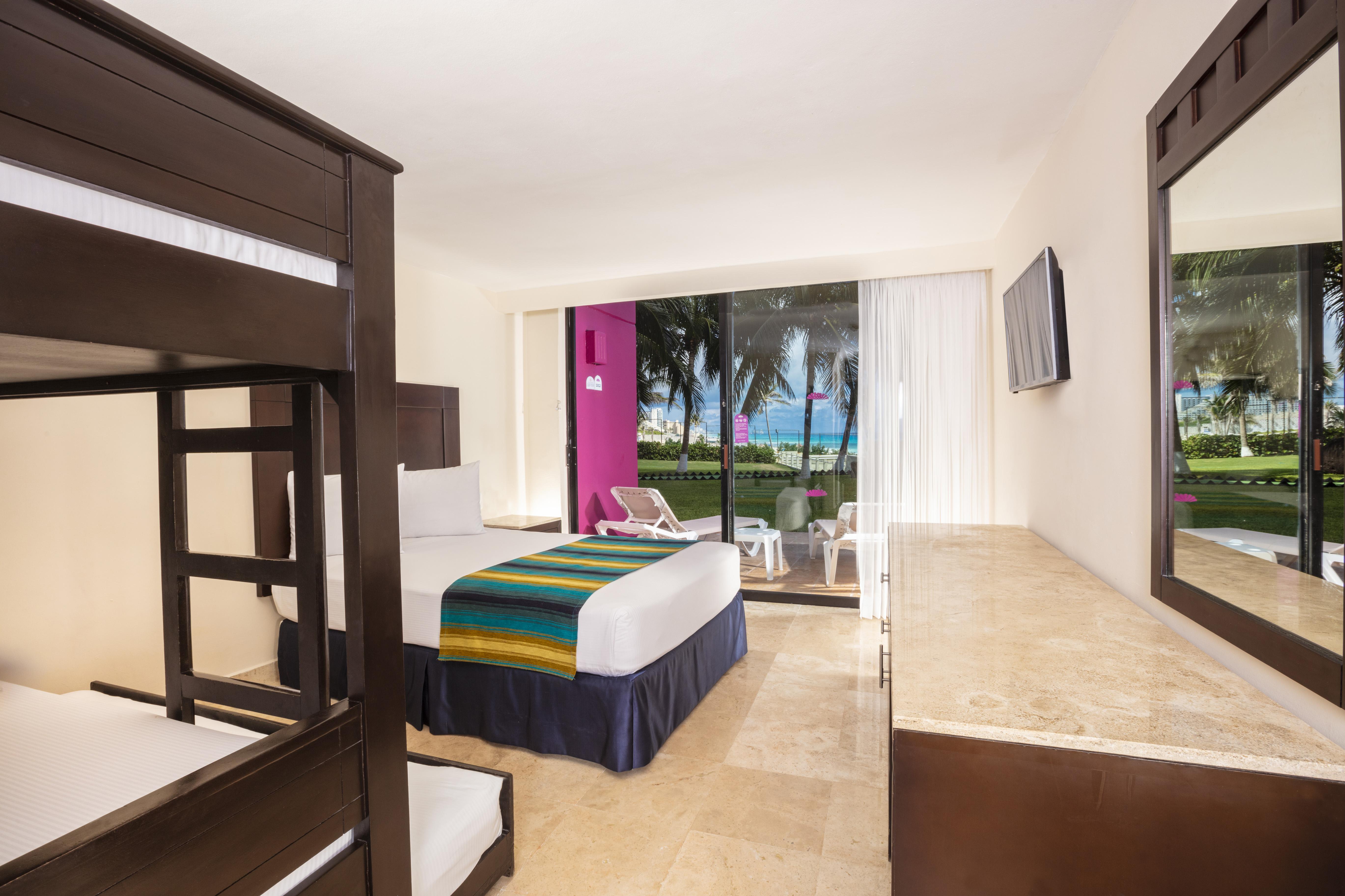 Crown Paradise Club Cancun Exterior photo Family room at the Hard Rock Hotel