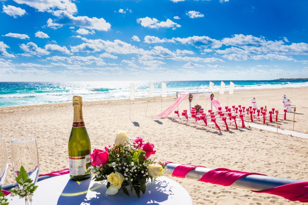 Crown Paradise Club Cancun Exterior photo A beach wedding in Cancun, Mexico