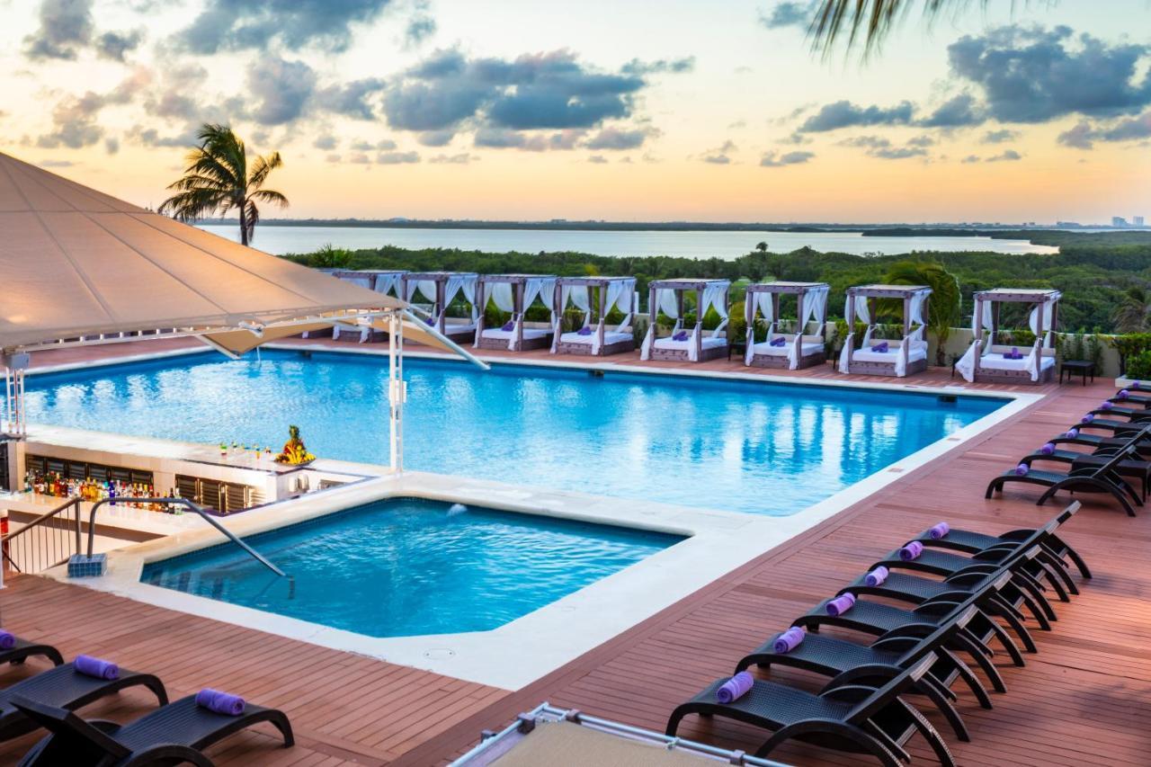 Crown Paradise Club Cancun Exterior photo Rooftop pool at the Grand at Moon Palace